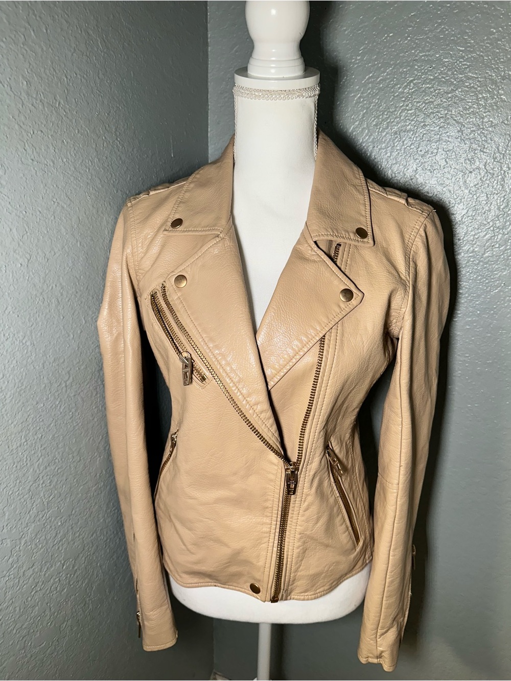 Blank NYC Beige faux Leather Moto Jacket with Asymmetrical Zip